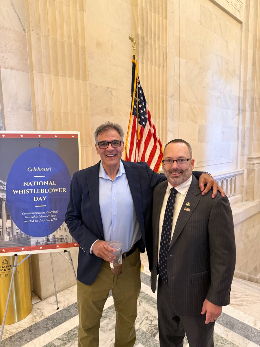 EverettStern1's tweet photo. Two men who lost everything, standing under the same flag.

That is @JohnKiriakou and me at National Whistleblower Day on Capitol Hill, and I want to tell you why this photo means more to me than most.

John Kiriakou was a @CIA officer. He spoke publicly about the agency's interrogation program because he believed it was wrong, and he went to federal prison for it. He lost his career, his pension, his freedom, and years with his children. He did not do it for attention. He did it because his conscience would not let him stay quiet.

I lost everything for telling the truth about a bank laundering money for terrorists and drug cartels. John lost everything standing up for what he believed was wrong inside a government. Different institutions, different decades, same price. We both know what it costs to see something, decide you cannot live with it, and refuse to find a way around it.

What people do not see from the outside is how lonely that road is. Most of the people who understand it are strangers to each other. So when you find someone who has walked it, who knows the cot and the silence and the phone that stops ringing, you do not need to explain anything. You just stand next to each other and that is enough.

@JohnKiriakou is a fighter. He came out of prison and kept talking, kept writing, kept showing up. You do not have to agree with a man on everything to respect what he was willing to pay. He has the highest respect I can offer, and I am proud to call him a friend.

To everyone still deciding whether to speak up: there are more of us than you think. And we stand with you.