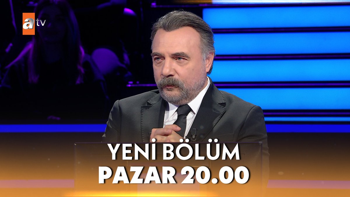 A bearded man in a black suit speaks on a TV set, with the 'atv' logo in the top left and text reading 'YENİ BÖLÜM PAZAR 20.00'.
