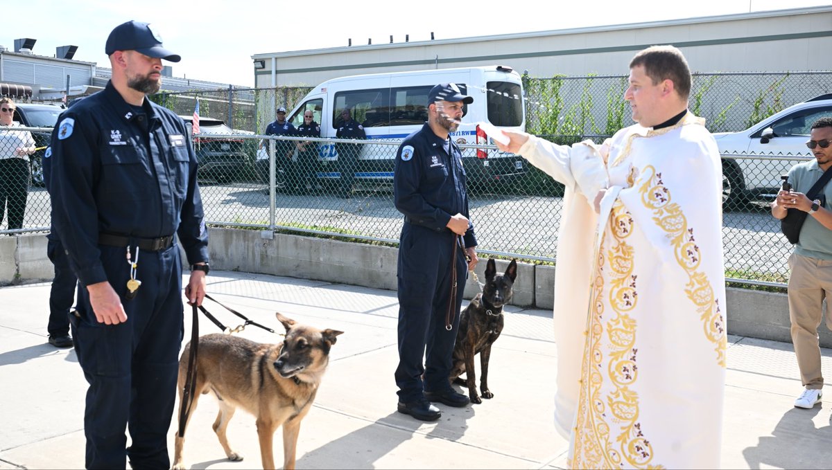 CorrectionNYC's tweet photo. For the first time in #NYCDOC history, members of The Boldest Family celebrated the #BlessingOfTheAnimals. Held this past Friday, the ceremony recognized the Feast of St. Francis of Assisi, the patron saint of animals and the environment. 

The feast, which is celebrated by millions around the world, is observed annually on Oct. 4. 

With leadership from Commissioner Stanley Richards and Chaplain Father Ihor Vorontsov, members gathered at the Department’s K-9 Compound on #RikersIsland to pray for our four-legged Officers and their handlers as they work diligently each day to keep the employees, visitors and people in our care safe. 

"Across NYC DOC, our working canines serve in different roles, but they share something important in common: each has developed a remarkable partnership with the men and women who work alongside them. These animals are trusted partners. They train alongside their handlers, work alongside them, and contribute every day to the safety and security of our Department,” @DOCCommish said. “Today gives us an opportunity to recognize their service and to show our appreciation not only for these remarkable animals, but also for the dedicated officers who train, care for and serve alongside them."

NYC DOC’s elite K-9 Unit is comprised of highly trained emergency responders who maintain safety within and around jails in the largest municipality in the country. You can also often find members of this unit visiting schools and communities to help teach the next generation of leaders about working in public safety.

Interested in this rewarding career path? Take the first step to join our bold team today by registering for the next @NYCDCAS Correction Officer Exam at https://t.co/9JTq8tr7Yi.  

View more highlights from the ceremony at https://t.co/mBkuuBxb39. #JoinTheBoldest #NYCDOCHeroes