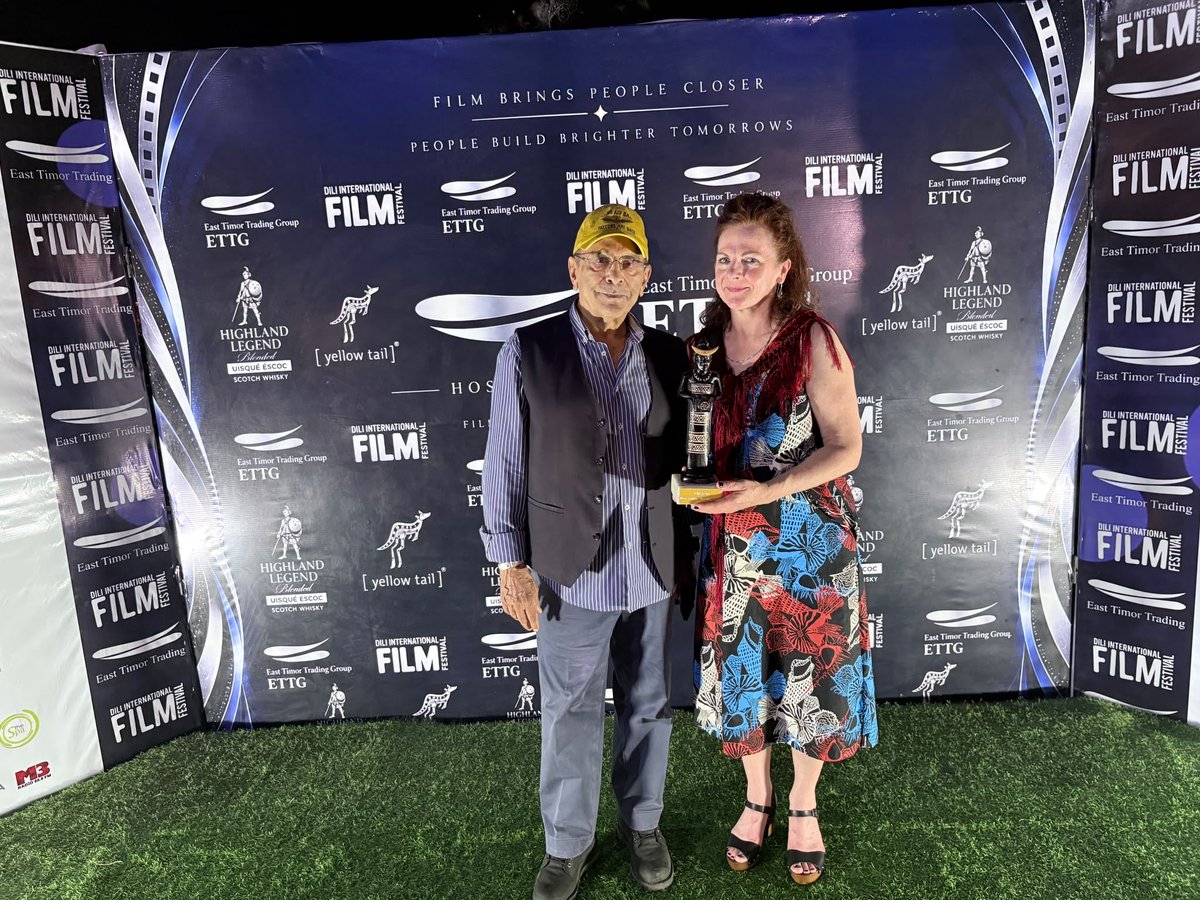 PaulieStewart's tweet photo. “Journey Home: David Gulpilil has won Best International Film at Dili International Film Festival” Here is writer producer director Maggie Miles receiving the award from Timor Leste President Dr Jose Ramos Horta! https://t.co/oUOwfppTeF