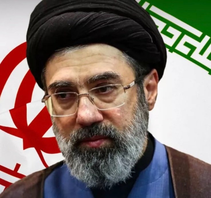 JChimirie66677's tweet photo. A Negligent Government, Warned and Unmoved

Iran has told Britain, in its own words, that it treats the Channel as a weapon. Iranian officials said their smuggling routes are "owned" in part by the IRGC and are "more useful" to Tehran than a missile, because they can move "revolutionary people" into London who simply wait to be told what to do. Tehran's own officials said this, on the record, describing the method themselves.

Sir Ken McCallum, the head of MI5, has said his agency has foiled more than twenty potentially lethal Iran-backed plots on British soil. Lord Walney's report found a network of UK charities spreading Khomeinist ideology, several in receipt of Gift Aid, with governance links to Iranian state institutions. The IRGC's Islamic Radio and Television Union operates openly from Manchester and Wembley, broadcasting praise for Hamas and Hezbollah commanders as martyrs. In September, the IRGC addressed an open letter not to the American public generally but specifically to "scholars, students, and members of the media", naming the audience it has judged most useful to its message. Every detail here is published record from the last twelve months, not speculation.

Then came RAF Fairford. Five British men were arrested near the base used by US bombers in operations against Iran, then bailed. A sixth man, a UK-Iranian dual national, was arrested in Westminster on suspicion of preparing terrorist acts and has also been bailed. Andy Burnham told the BBC there were "strong indications" Iran was involved. Benjamin Netanyahu has since claimed Israel handed British authorities intelligence warning of an "Iranian-sponsored attack", only for Britain to announce sanctions on Israeli settlement trade the following day. Whatever the truth of that sequence, a Prime Minister has publicly linked a hostile state to an attempted attack on a British airbase, and the men investigated over it are walking free on bail.

This is the government that continues to welcome boats carrying record numbers of unvetted arrivals, dispersing them across the country, no verification against watchlists and no way of ruling out exactly the embedding Iran itself has described. A government cannot claim ignorance of a threat it has proscribed. It designated the IRGC under state-threat powers in July. It has read Walney's report. It has heard its own intelligence chief's warnings. And it continues operating a system Jonathan Hall KC has already found releases people before checks are complete.

Call it what it is. A government told exactly what the threat looks like and still failing to close the gap it moves through is negligence. Continuing to process record Channel numbers through a system its own reviewer says cannot reliably verify who is arriving is recklessness. And when ministers call for calm, dismiss the question as alarmist, or sanction the very ally offering intelligence on the threat, the word edging into view is complicity, not with Tehran's aims, but with the conditions that let Tehran's method keep working.

Russia weaponises migration on NATO's eastern border, and Western governments say so plainly. Iran has told Britain, through its own officials, that it does the same across the Channel. The difference is that nobody in Warsaw or Vilnius pretends not to have heard it. Britain has heard it from Tehran directly, confirmed it through its own intelligence service, and chosen to keep the door exactly as open as before.

Nobody in government can say they were not warned. The warnings came from Iran's own mouth.

Prime Minister, Andy Burnham and Mojtaba Khamenei, the Iranian Supreme Leader. "Iran has told Britain, in its own words, that it treats the Channel as a weapon."