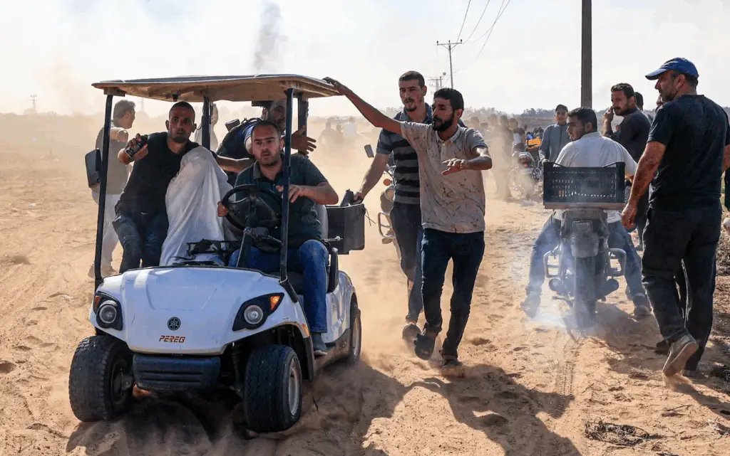 October7Attack's tweet photo. Gazan civilians abducting an Israeli woman.
This is October 7. https://t.co/rvNCjIZXhN
