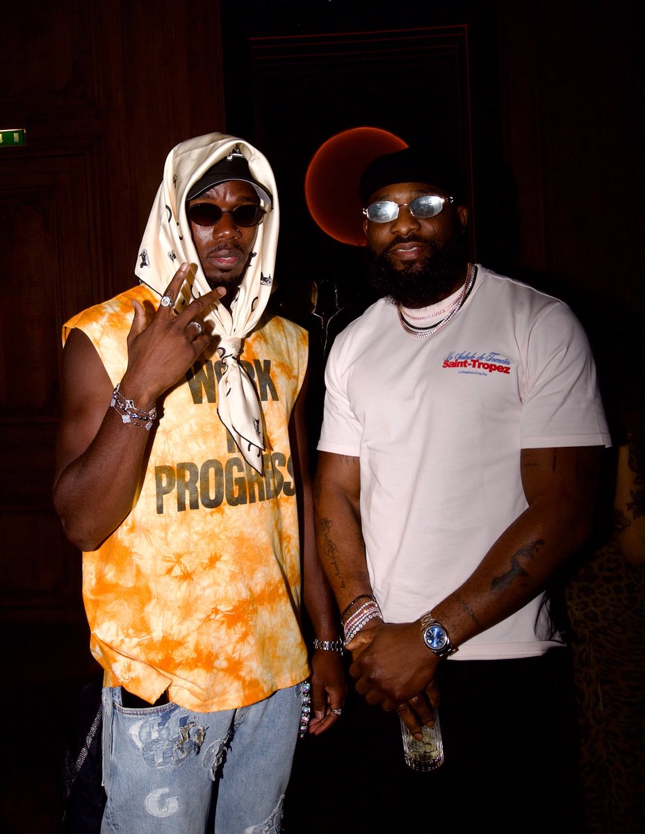 RotimyRudeBoi's tweet photo. Fashion week is truly amazing..Pogba walked up to me and asked about my hat,we shared conversations and ended up taking this picture. I’m definitely sending him his own hat this week! Genuinely humble 🐐 @paulpogba https://t.co/ukXFBlLEJS