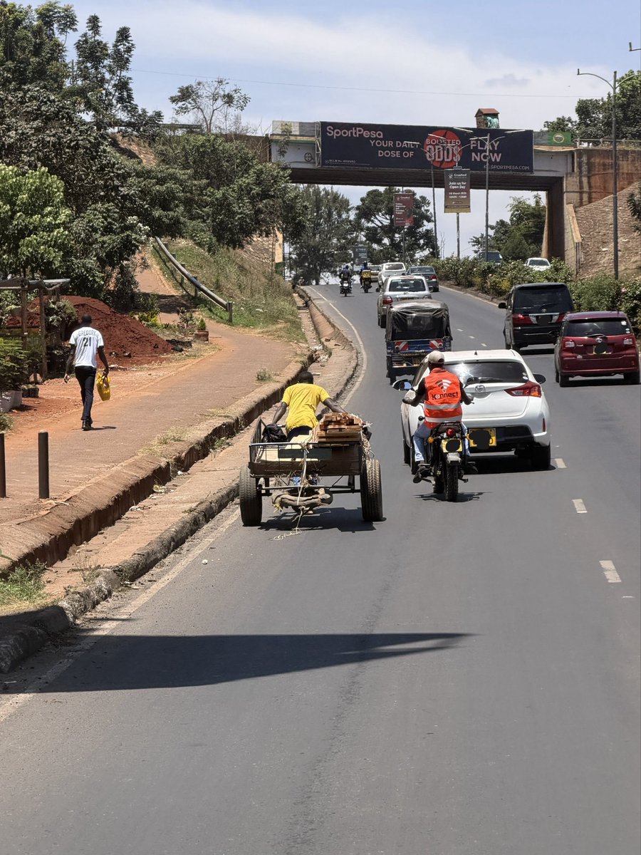 Alfayaz11's tweet photo. I have said this repeatedly, we simply do not value human life enough in this country. We are losing too many lives each day on our roads, mostly through accidents that are completely avoidable.

Our road and public transport system is broken, with little respect for law and order. We have failures like @ntsa_kenya with their nonstop PR gimmicks, agencies like @KeNHAKenya , my brother @MuriraKinoti and his able team at @KURAroads , together with our world class urban visionaries at @047County , who have neglected the basics and chosen to look the other way.

This is Redhill Bypass. We already have tuk tuks, boda bodas, stalls, matatus most of which unroadworthy parked at a roundabout and all manner of obstruction. Now we have mikokoteni on it too.

Enforcement creates discipline. Discipline becomes a habit, and over time that habit becomes a culture. Until we understand this, the chaos on our roads will continue and we will keep losing lives unnecessarily.

It is what it is.