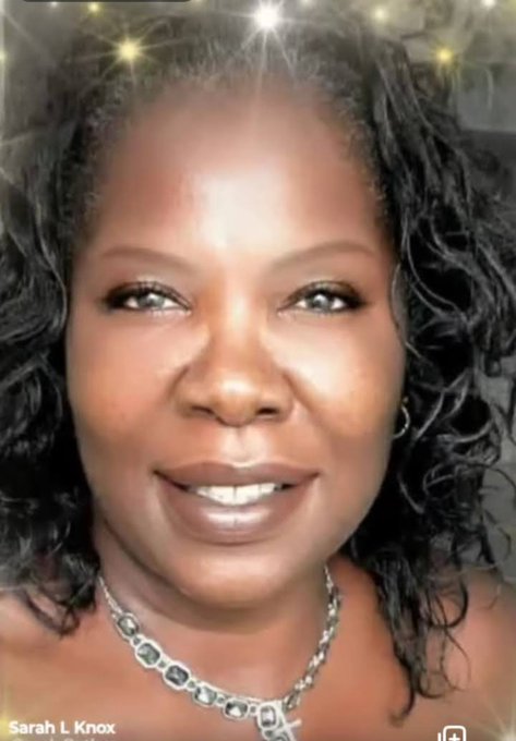 A close-up portrait of a smiling Black woman with curly hair wearing a silver necklace, labeled 'Sarah L Knox' at the bottom of the image.