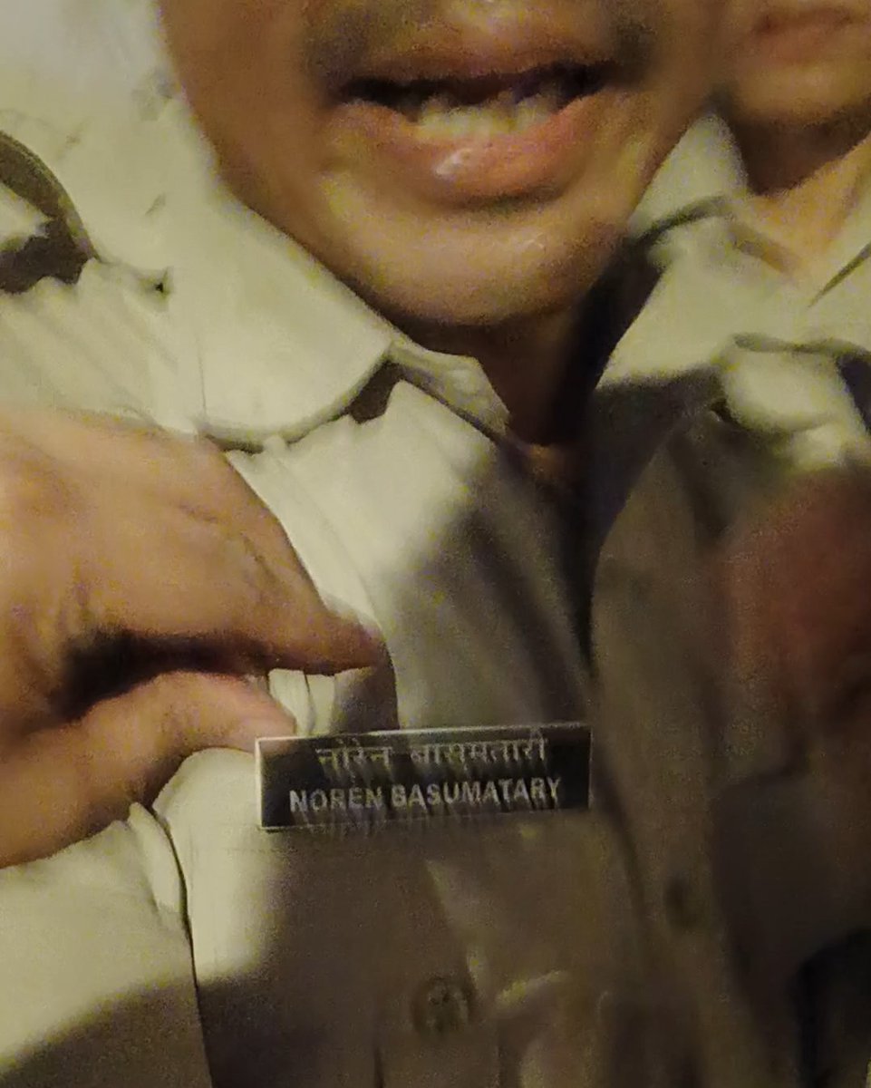 sighyush's tweet photo. Badge of the cop who assaulted journalists. https://t.co/8cAN3RZBlX