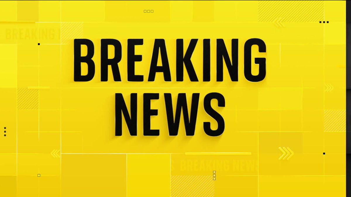 The image is a generic "BREAKING NEWS" graphic featuring bold black text on a yellow background, serving as a broadcast visual template for the accompanying news item about the Green Party passing the "Zionism is Racism" motion at its Brighton conference.