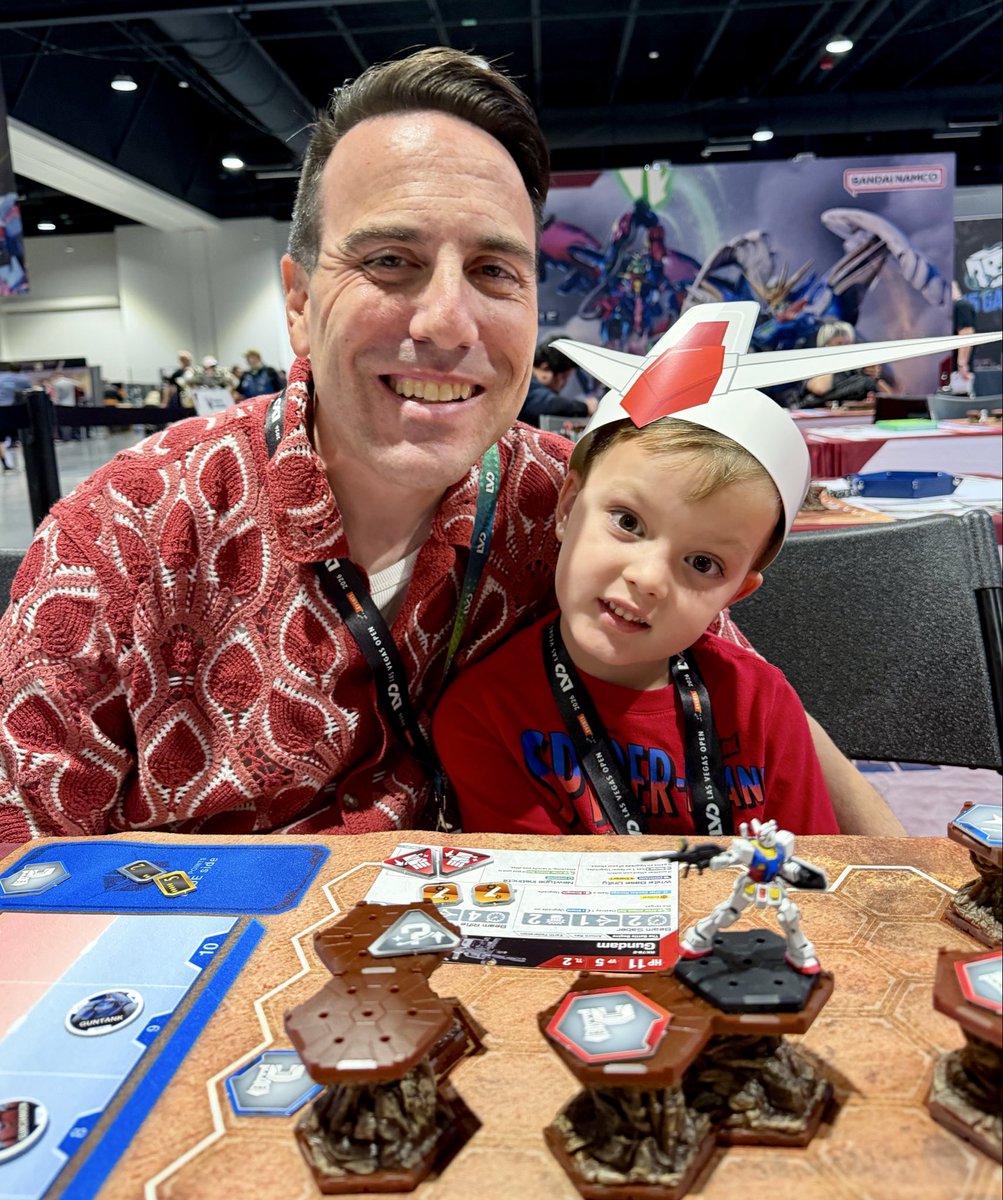 TheDadLife's tweet photo. First mini. First game. Took it all home before the release 🔥

Hit the @BandaiHobbyUS booth at Las Vegas Open. He painted his first miniature and playtested Gundam Assemble. Bought Starter Set 01 prerelease and took it home! 

Welcome to miniatures 😎 https://t.co/G0r78YZ9Je