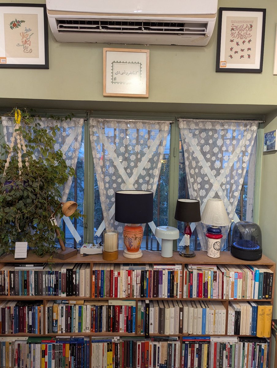 docstobar's tweet photo. Shopping for books in Tehran, around Iranshahr

(One bookstore has kept the tape on its windows to protect against shattering glass in the event of a bombing) https://t.co/TCkbp4Rxcw