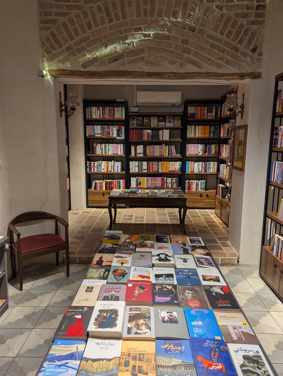 docstobar's tweet photo. Shopping for books in Tehran, around Iranshahr

(One bookstore has kept the tape on its windows to protect against shattering glass in the event of a bombing) https://t.co/TCkbp4Rxcw
