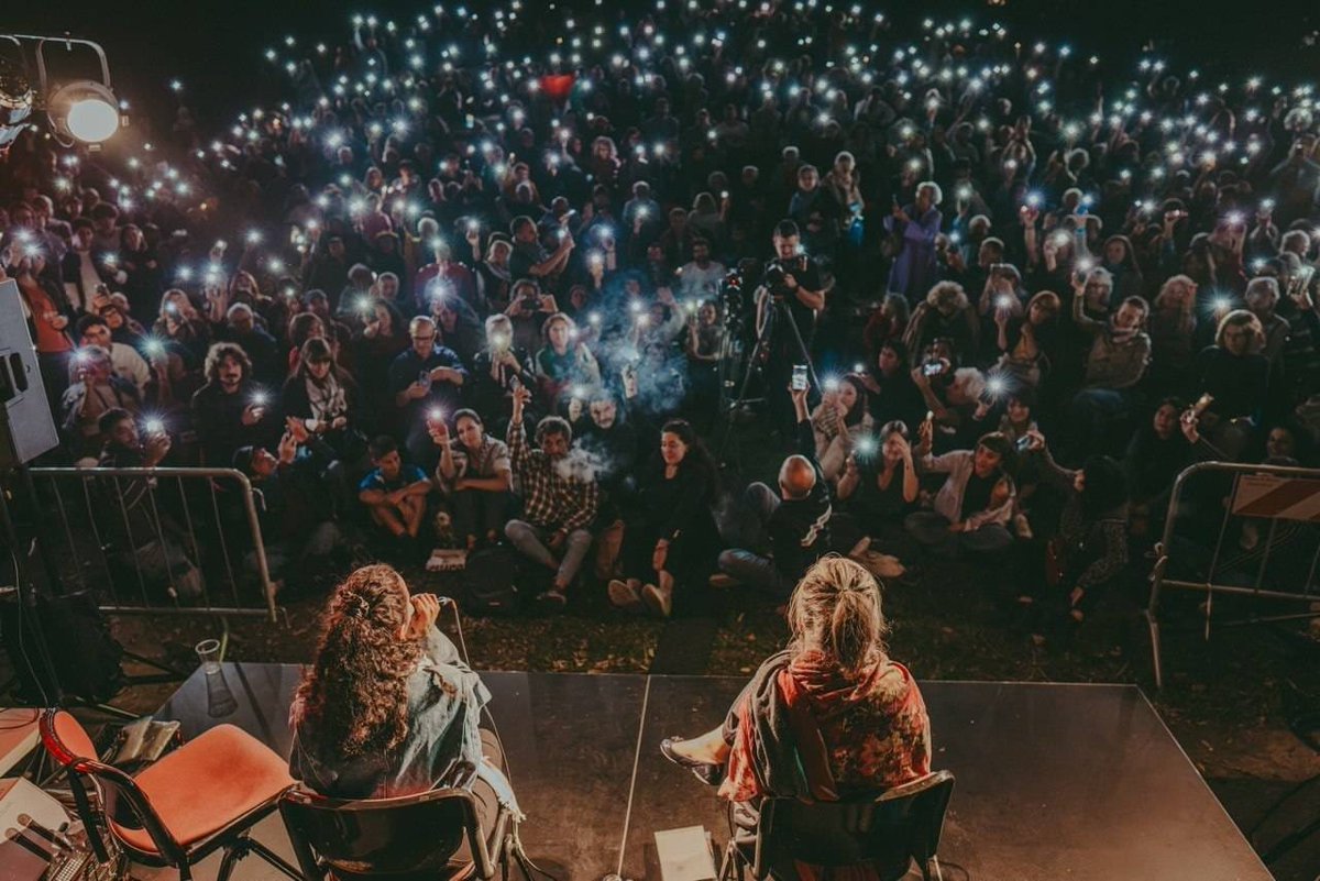 FranceskAlbs's tweet photo. I hope people in #Gaza can see this.
#Milan 3/10/26: young people lit their phones in the dark to tell their peers in Gaza: you are not alone; spontanously they sang Free Palestine.
The young generation, marked by the genocide, will see apartheid Israel in the dock. #CSALambretta https://t.co/tPfwehANY2