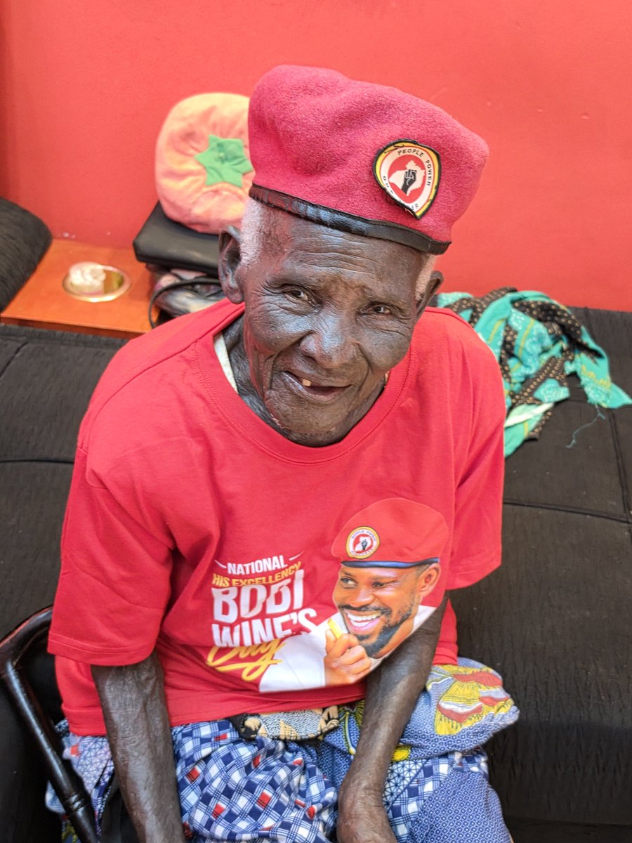 DavidLRubongoya's tweet photo. On this second edition of #BobiWinesDay, we spent some precious time with one of his elderly friends and most loyal supporters, Jajja Tausi, who hasn’t been feeling well. She was overjoyed to receive customized #BobiWinesDay T-shirts for herself and her grandchild. The ultimate highlight of her day, however, was getting a surprise phone call from @HEBobiwine directly! In return, she blessed us with a powerful duwa. We pray for her quick, complete recovery and remain deeply grateful for her unwavering commitment to the people's cause.