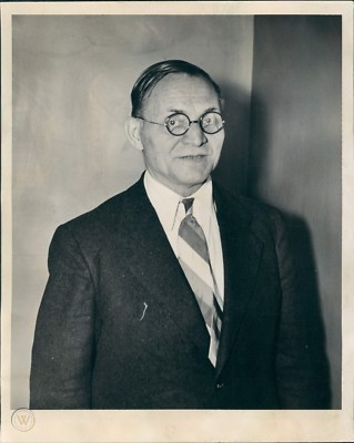 MttCarmichael's tweet photo. dr wilhelm loeser (aka ralph robiend) had it all. a prussian immigrant who came to chicago as a boy, he earned his medical degree in 1905 and built a practice as a licensed pharmacist and high-profile plastic surgeon to the stars of the gold coast.

but the honeymoon wouldn't last, and before long the intoxicating allure of the city paired with an ease of access put him on the wrong side of the law.

in 1913, loeser was sentenced to three years for dealing narcotics.

but he would only serve 18 of those 36 months, thanks to one fast-talking acquaintance named louis piquett, a former train-hopping stanford track star who went on to box professionally up and down the west coast, pursing enough money to open a cigar shop in san francisco that would later go up in smoke during the earthquake of 1906, and who was now a bartender and naturally corrupt democrat with connections to city hall. as such, he used his influence to grease the time loeser would serve.

loeser was paroled and fled the country, swearing never to return to chicago ever, ever again...

unless, the plastic surgeon thought to himself on the train south, as the skyline receded proportionately into the facial cavity of night...unless some handsome, robin-hood type rabble-rouser were to ever offer me thousands of dollars to come back and perform radical, law-evading facial alterations.

as luck would have it, some twenty or so years later, a yung thug called "jimmy lawrence" was offering thousands of dollars to smooth out some scars, clean up a few moles, and hammer out a chin dimple so he could do things like go to the biograph theater with colorfully dressed women and watch clark gable films without being identified and shot by federal agents.

when loeser (who was by then down in mexico, by the sea, working on his boat) received word of the potential commission, he chuckled at the absurdity of the loophole having actually presented itself, and then he hailed a cab back home. 

take me to 2509 n crawford ave in chicago, safehouse of the mobster james jimmy probasco! he told the driver.

over the next 48 hours, loeser and another surgeon named harold cassidy went to work on jimmy lawrence. they used kangaroo tendon to lookmaxx his cheekbones and a solution of caustic acid was employed to erase the patient's fingerprints. at one point during the operation, jimmy lawrence was overdosed on ether, swallowed his tongue, and stopped breathing.

the whole ordeal was a botched disaster. the kangaroo tendon dissolved into painful and agonizing facial infections, the acid barely burnt the outer layer of skin, leaving the loops and whorls of his fingerprints completely visible, and fellow outlaw homer van meter, who was operated on next door, hated his own mangled face so much he pulled a gun on loeser and demanded a full refund. louis piquett, who had brokered the surgery, called the procedures a total failure and refused to pay the surgeons their fee.

by the time the bill coding was settled, jimmy lawrence was a fresh new man, but not new enough for the unblinking gaze of law enforcement. despite the new appearance, a tenacious young fbi agent named melvin purvis still recognized jimmy lawrence standing outside the movie theater later that summer. purvis lit a cigar, and the rest is history.

and that clerk, jimmy lawrence? his real name was john herbert dillinger... america's first public enemy no. 1. 

it was a good job the surgeon did, purvis later remarked, but i knew him the minute i saw him.

and now you know... the rest of the sto--