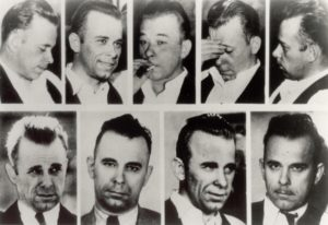 MttCarmichael's tweet photo. dr wilhelm loeser (aka ralph robiend) had it all. a prussian immigrant who came to chicago as a boy, he earned his medical degree in 1905 and built a practice as a licensed pharmacist and high-profile plastic surgeon to the stars of the gold coast.

but the honeymoon wouldn't last, and before long the intoxicating allure of the city paired with an ease of access put him on the wrong side of the law.

in 1913, loeser was sentenced to three years for dealing narcotics.

but he would only serve 18 of those 36 months, thanks to one fast-talking acquaintance named louis piquett, a former train-hopping stanford track star who went on to box professionally up and down the west coast, pursing enough money to open a cigar shop in san francisco that would later go up in smoke during the earthquake of 1906, and who was now a bartender and naturally corrupt democrat with connections to city hall. as such, he used his influence to grease the time loeser would serve.

loeser was paroled and fled the country, swearing never to return to chicago ever, ever again...

unless, the plastic surgeon thought to himself on the train south, as the skyline receded proportionately into the facial cavity of night...unless some handsome, robin-hood type rabble-rouser were to ever offer me thousands of dollars to come back and perform radical, law-evading facial alterations.

as luck would have it, some twenty or so years later, a yung thug called "jimmy lawrence" was offering thousands of dollars to smooth out some scars, clean up a few moles, and hammer out a chin dimple so he could do things like go to the biograph theater with colorfully dressed women and watch clark gable films without being identified and shot by federal agents.

when loeser (who was by then down in mexico, by the sea, working on his boat) received word of the potential commission, he chuckled at the absurdity of the loophole having actually presented itself, and then he hailed a cab back home. 

take me to 2509 n crawford ave in chicago, safehouse of the mobster james jimmy probasco! he told the driver.

over the next 48 hours, loeser and another surgeon named harold cassidy went to work on jimmy lawrence. they used kangaroo tendon to lookmaxx his cheekbones and a solution of caustic acid was employed to erase the patient's fingerprints. at one point during the operation, jimmy lawrence was overdosed on ether, swallowed his tongue, and stopped breathing.

the whole ordeal was a botched disaster. the kangaroo tendon dissolved into painful and agonizing facial infections, the acid barely burnt the outer layer of skin, leaving the loops and whorls of his fingerprints completely visible, and fellow outlaw homer van meter, who was operated on next door, hated his own mangled face so much he pulled a gun on loeser and demanded a full refund. louis piquett, who had brokered the surgery, called the procedures a total failure and refused to pay the surgeons their fee.

by the time the bill coding was settled, jimmy lawrence was a fresh new man, but not new enough for the unblinking gaze of law enforcement. despite the new appearance, a tenacious young fbi agent named melvin purvis still recognized jimmy lawrence standing outside the movie theater later that summer. purvis lit a cigar, and the rest is history.

and that clerk, jimmy lawrence? his real name was john herbert dillinger... america's first public enemy no. 1. 

it was a good job the surgeon did, purvis later remarked, but i knew him the minute i saw him.

and now you know... the rest of the sto--