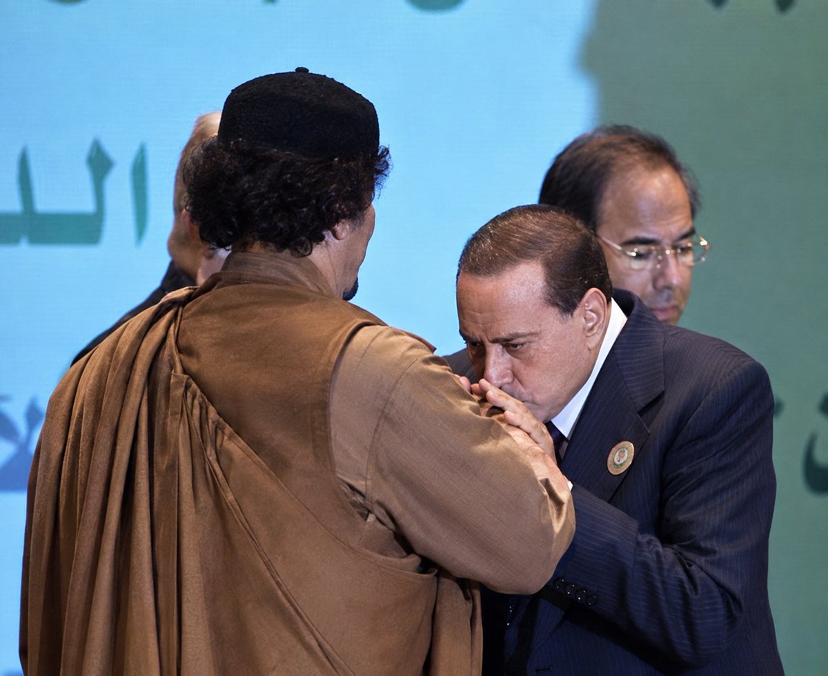 _moussa_ibrahim's tweet photo. In 2008, Muammar Gaddafi achieved something extraordinary in the history of Africa’s relationship with its former colonial powers.

Italy was compelled to confront the crimes of its colonial occupation of Libya and accept material responsibility for that history.

The agreement was much bigger than the famous $5 billion figure.

Italy committed $5 billion for major infrastructure projects over twenty years. But the settlement also included treatment in Italy for Libyan victims of colonial mines, scholarships for Libyan students, the restoration of pensions to eligible Libyans and their heirs, the return of manuscripts and archaeological treasures taken during colonialism, housing initiatives, demining and rehabilitation programmes.

This was not symbolism.

Gaddafi understood that colonialism could not be answered merely with an apology. If colonial occupation produced material destruction, dispossession and suffering, then historical responsibility also had to acquire a material form.

For Africa, the lesson remains important.

The former coloniser did not simply say: we are sorry.

It was made to answer for the past.

That is what political power and historical memory can achieve when a nation negotiates from a position of sovereignty.