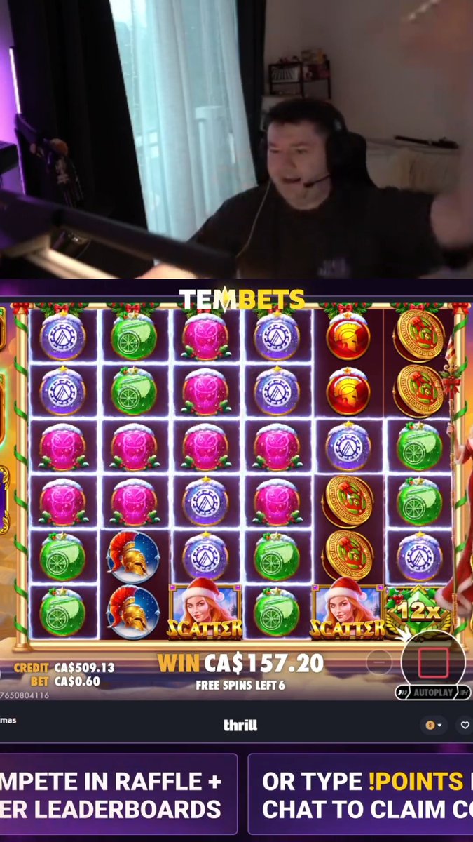 A split-screen stream showing a man wearing headphones laughing in the upper portion and a Christmas-themed slot machine game below titled 'TEMBETS' showing a 'WIN CA$157.20' with 'FREE SPINS LEFT 6'.