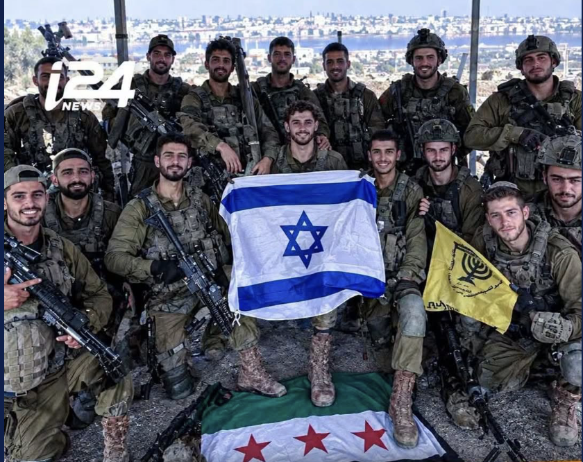asaadhanna's tweet photo. Israeli media such as @i24NEWS_EN is using Ai generated media to insight hate and rage with the Syrian people.
They published this pic saying its Israeli soldiers stomping on the Syrian flag in Daraa, while its totally fake and Ai generated. https://t.co/NA3ZekookD