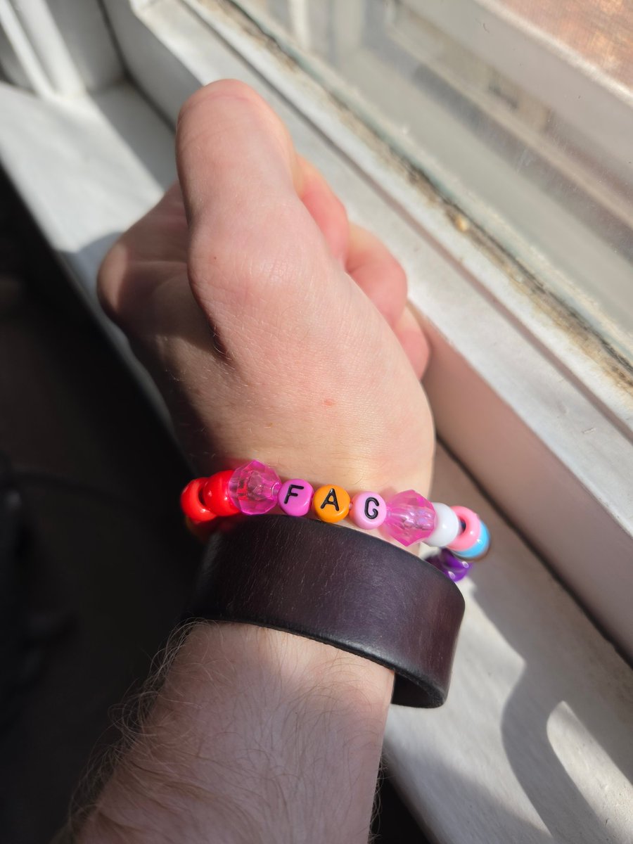 WetPupPippin's tweet photo. A sweet pubby gave this to me at the pup mosh and I love it 🥹 It's the progress pride fa- er, flag https://t.co/58o5wAEwut
