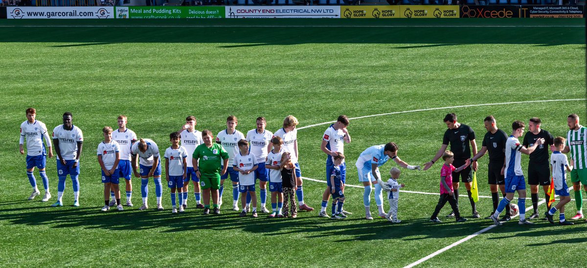 GomboczSteve's tweet photo. Pre match etiquette before the match between Bury and Bromsgrove Sporting on the 3rd October 2026 including applause in memory of Bury player Courtney Meppen-Walter. @buryfcofficial #bfc140 #shaker #BuryFC #PartOfit @whitebluearmy https://t.co/okm4lK7sbC