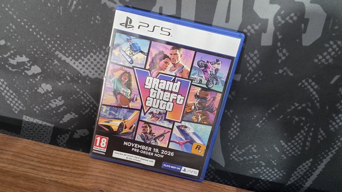 davngta's tweet photo. 🚨 MAJOR GTA 6 LOOK AT RETAIL

A PS5 GTA VI pre-order display case has now been spotted in-store, giving us a clear look at the game’s physical retail presentation.

The case features the official cover art, PEGI 18 rating and the November 19, 2026 release date.

Rockstar’s retail rollout is officially getting started. 👀

#GTA6 #GTAVI #RockstarGames