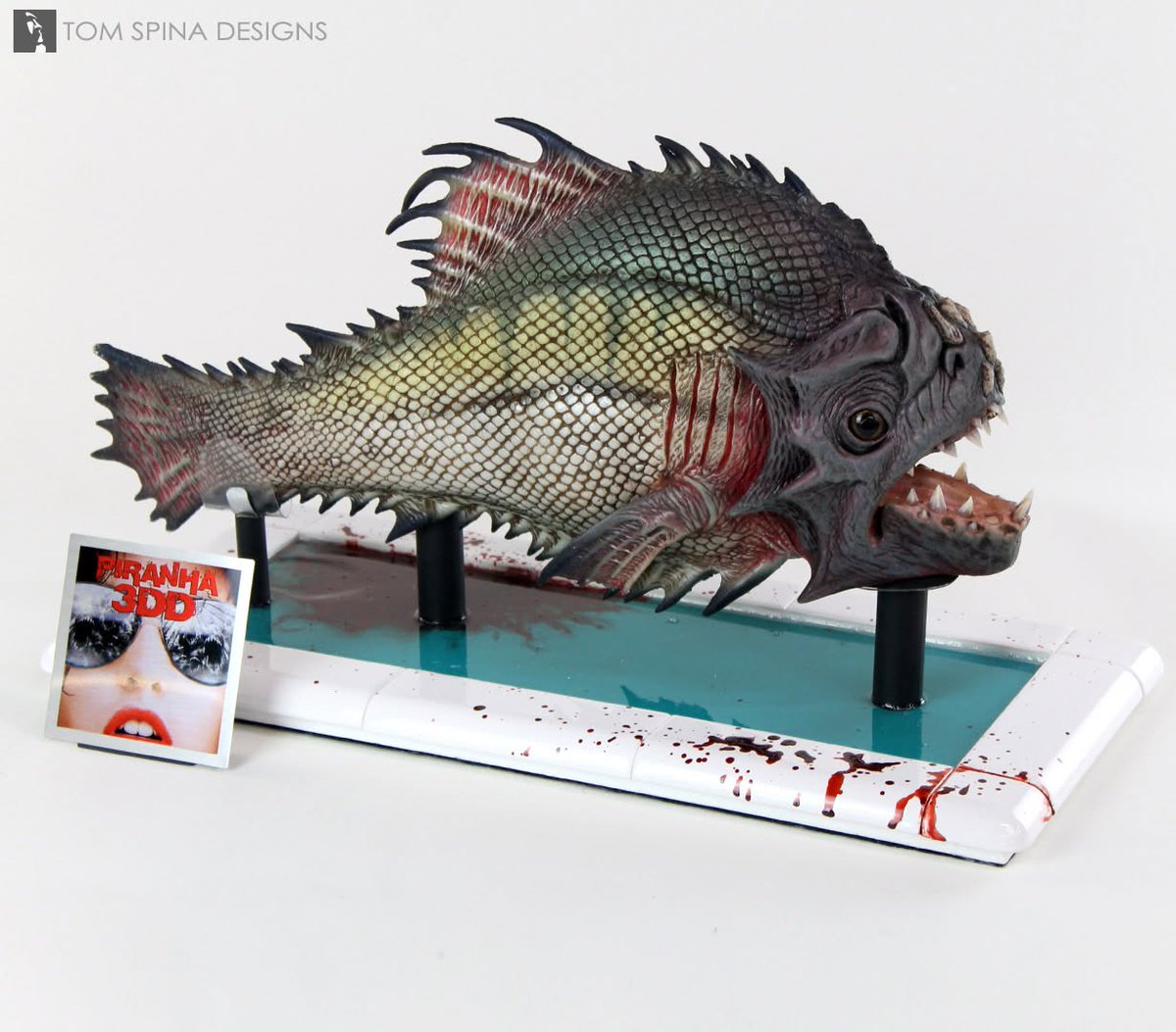 TomSpinaDesigns's tweet photo. This original silicone puppet from 2012's horror comedy #Piranha 3DDD was in great condition with its faux blood FX syringe, and just needed some "pool" theming for context. See more: https://t.co/cbs3SKjeBZ

#TomSpinaDesigns #horror #movieprops https://t.co/57AcI8iEUF
