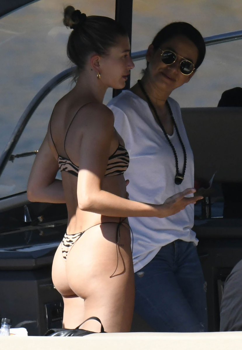 DateeD1's tweet photo. Hailey Bieber and Bella Hadid enjoy a day off from shooting a new Versace campaign with some fun in the sun off the coast of Sardinia, Italy. https://t.co/Y4UkL6yxL8