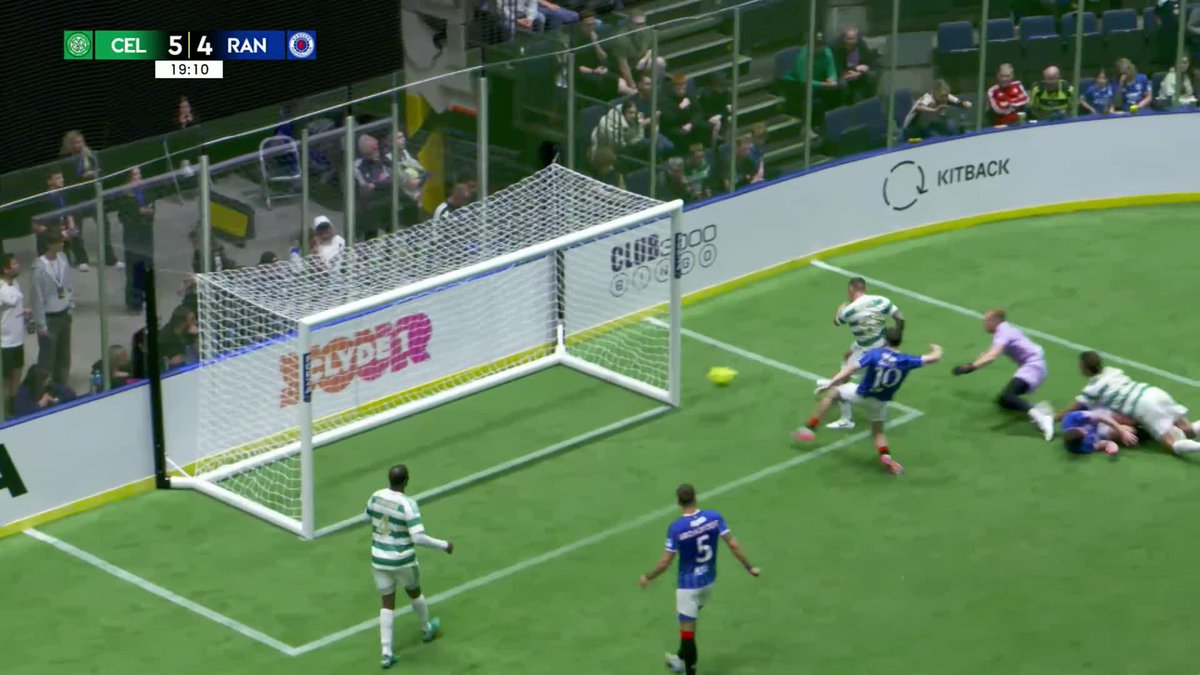 A screenshot from a soccer match between Celtic (CEL) and Rangers (RAN), with the score 5-4 and a player taking a shot on goal.