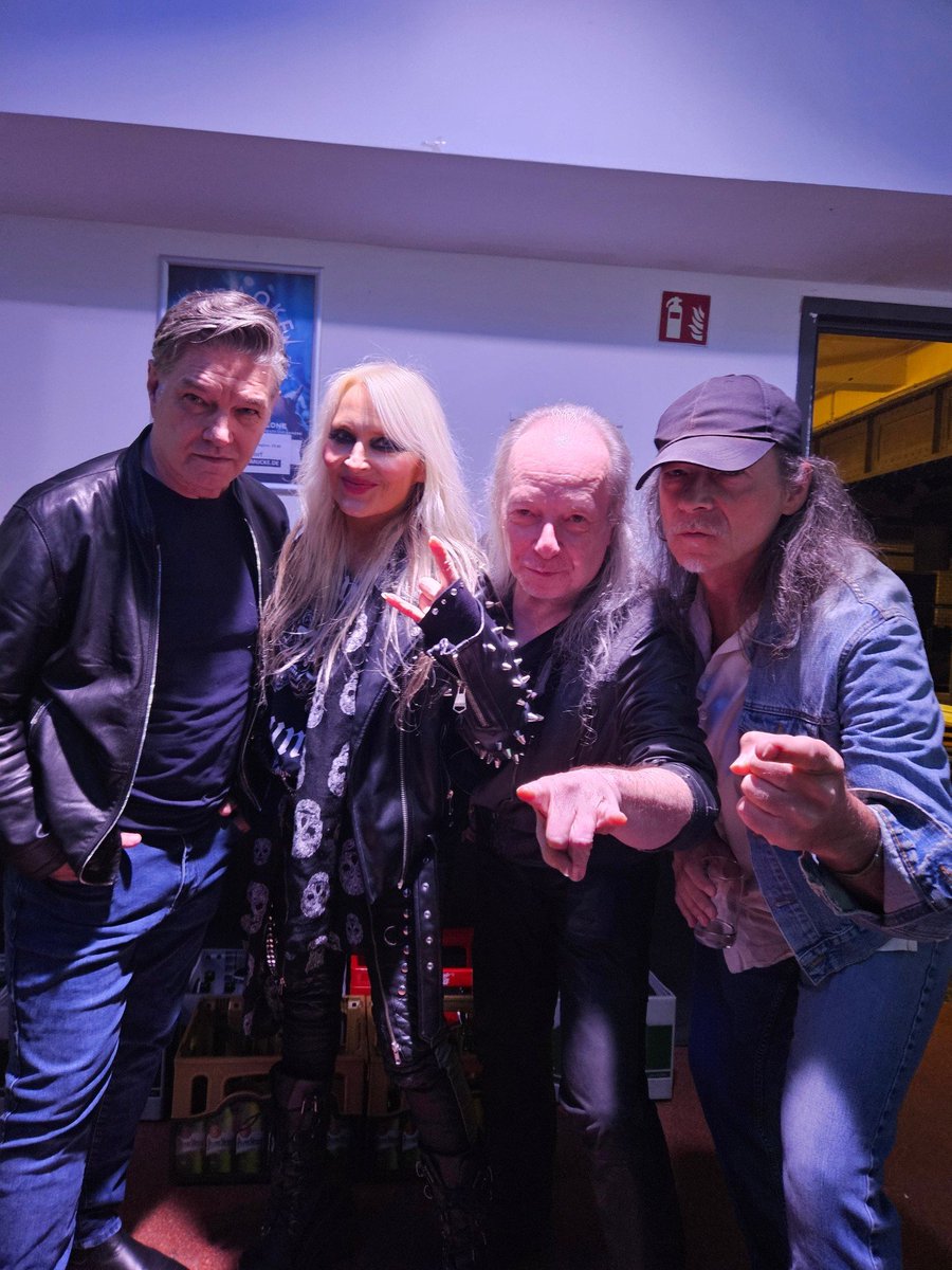 DoroPesch_'s tweet photo. This was a night of the #Warlock! Hello from the (in)famous Ronsdorfer Street in Düsseldorf, Germany. This is where we rehearsed back then and where it all started! And here we are in 2026: 4/5 of the 1986 line-up of Warlock.
#PeterSzigeti - #MichaelEurich 
Still true as steel! https://t.co/CcDv7Y4aGv