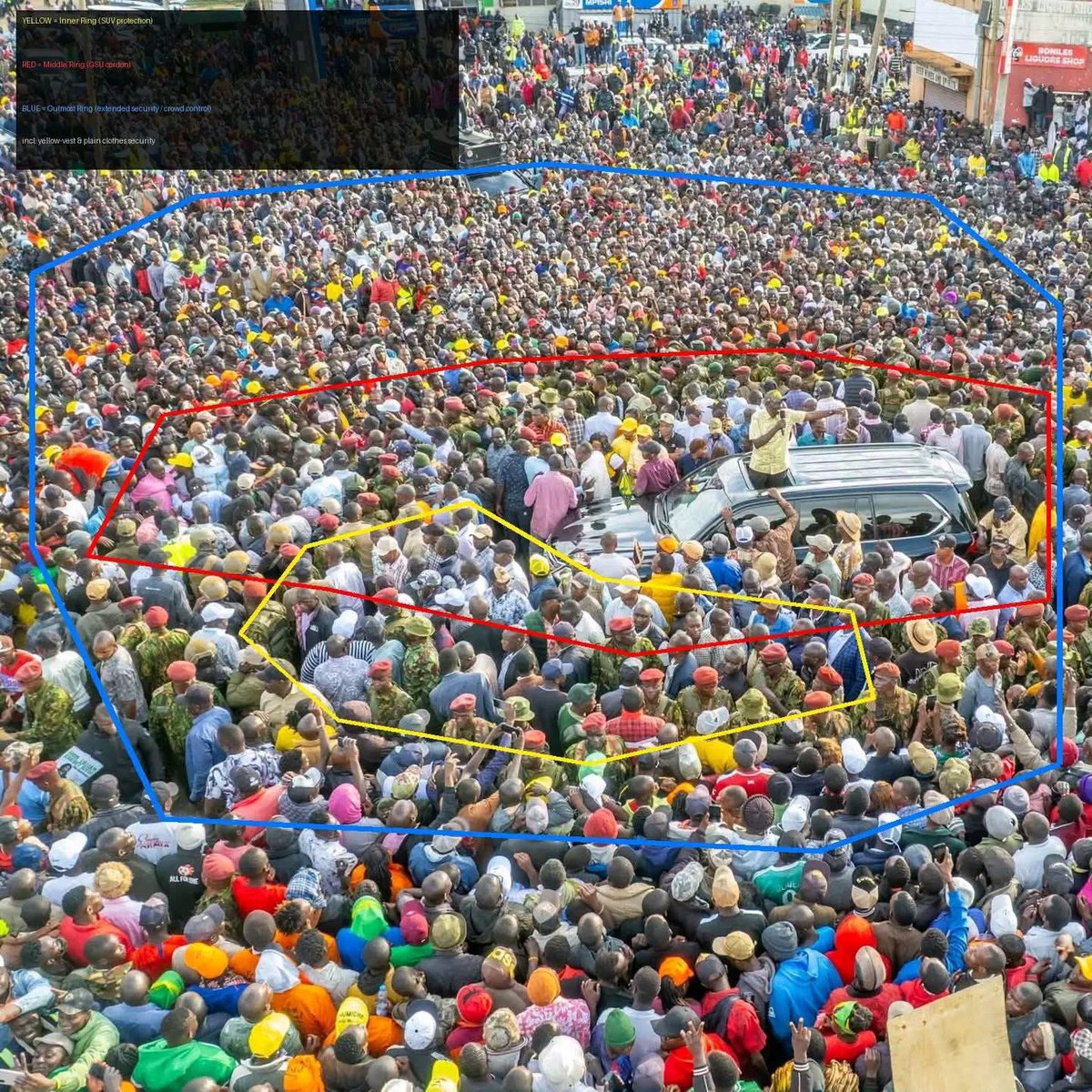 NytoP2PMwangi's tweet photo. LOOK AT THIS PHOTO BEFORE YOU TRY ANYTHING STUPID NEAR THE PRESIDENT.

You think it's just a crowd? This is a 3-ring KILL ZONE.

YELLOW RING - THE INNER RING (PEU):
The men on the SUV. Recce Company, the most lethal unit in Kenya Police. Their job is not to arrest you. Their job is to take the bullet and finish you. Led by Oscar 1, they are an arm's length from the President always.

RED RING - THE MIDDLE RING (GSU):
Over 200 GSU G-Company officers in red berets. They form a human wall. They scan for sudden movements, a hand going into a pocket, someone throwing something. You will never break this cordon. Remember what happened after the last breach? The Commandant was transferred immediately.

BLUE RING - THE OUTER RING (INVISIBLE):
This is where you lose. Regular police, yellow vests, BUT ALSO NIS and plainclothes officers INSIDE the crowd pretending to be supporters. They profiled the area days ago. Snipers are on the rooftops. JOC is watching live.

WHAT YOU DON'T SEE:
The armored car, the signal jammer that blocks phone bombs, the decoy cars, the KDF evacuation team on standby.

2002 Moi was stoned. 2015 a man tried to stone Uhuru in Migori - he died mysteriously later. 2025 shoe thrown at Ruto - protocols were changed nationwide.

The President is not vulnerable because he stands on his car. He stands on his car because he is the MOST PROTECTED MAN in Kenya.

Don't mistake ACCESSIBILITY for VULNERABILITY.

~ Orina Makori