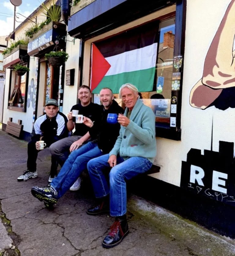 DiscipleElland's tweet photo. A few of the music legends who have publicly supported both the Garvaghy Road residents and the ongoing plight of the Palestinian people.    🇮🇪🇵🇸

Paul Weller is pictured alongside two members of Kneecap and also their manager Daniel Lambert outside his Community Cafe in Phibsborough, Dublin. 

@paulwellerHQ 
@dlLambo 
@KNEECAPCEOL