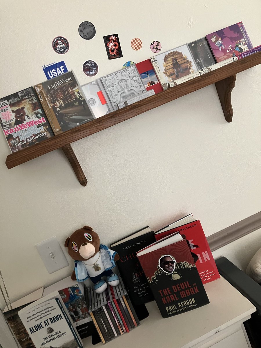 taxfraudtortue's tweet photo. Kanye shelf expands, every cd from college dropout to donda with every deluxe release and bonus tracks, along with the college dropout video anthology and the late orchestration cd/dvd https://t.co/iDePMIRCLf