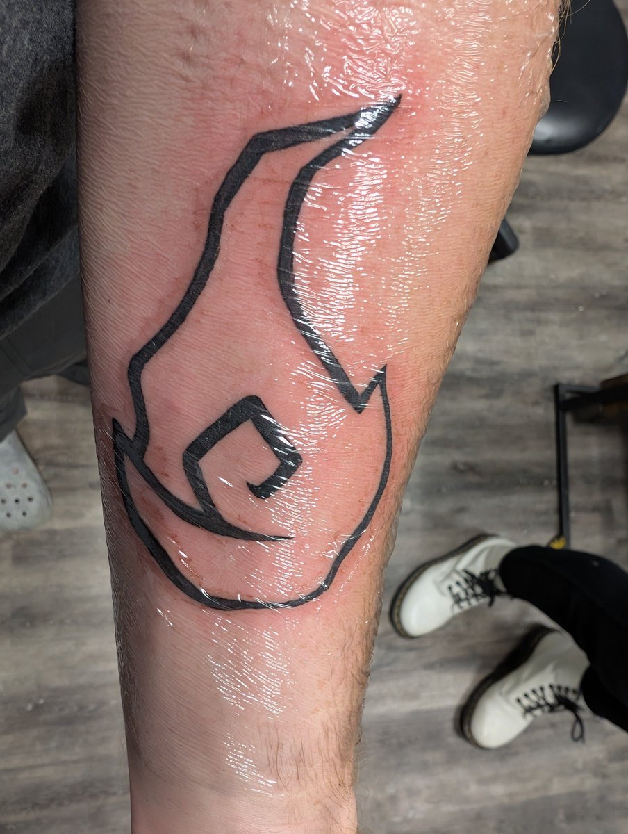 CrowRenVT's tweet photo. Got my first tattoo! This symbol represents the first vtuber community that means a lot to me and I'm proud to be apart of the pyro pups! 
#Sinderdoodle https://t.co/TZ2avml9kq