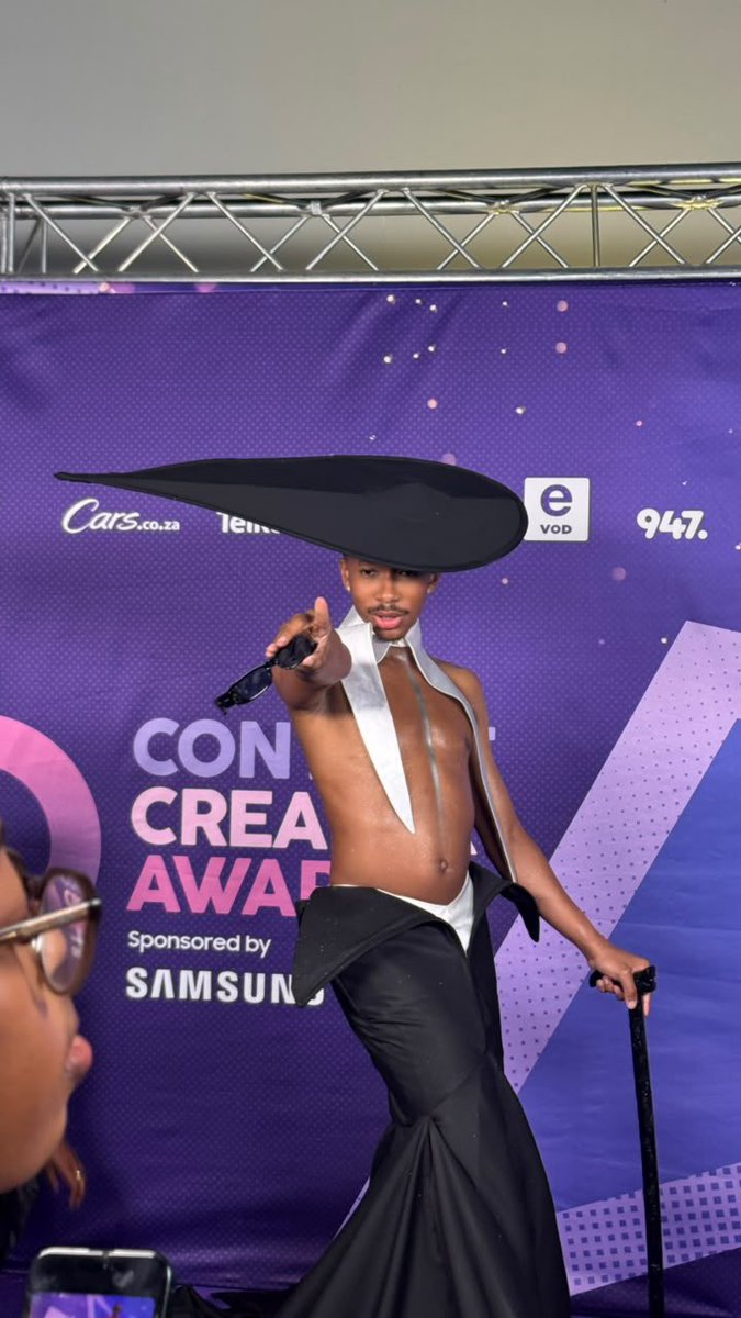 Jabu_Macdonald's tweet photo. Media personality Lasizwe on the purple carpet at the Content Creator Awards. 

#GalaxyZFold8 #ContentCreatorAwards https://t.co/QwQOu8Muu8