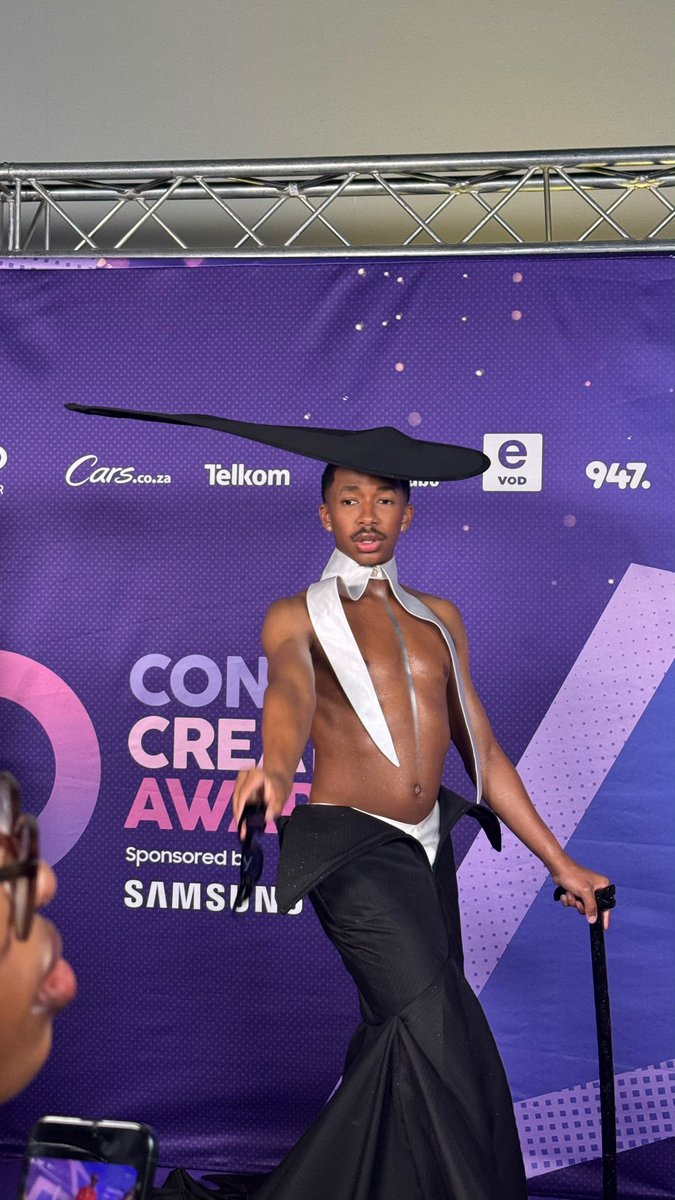 Jabu_Macdonald's tweet photo. Media personality Lasizwe on the purple carpet at the Content Creator Awards. 

#GalaxyZFold8 #ContentCreatorAwards https://t.co/QwQOu8Muu8