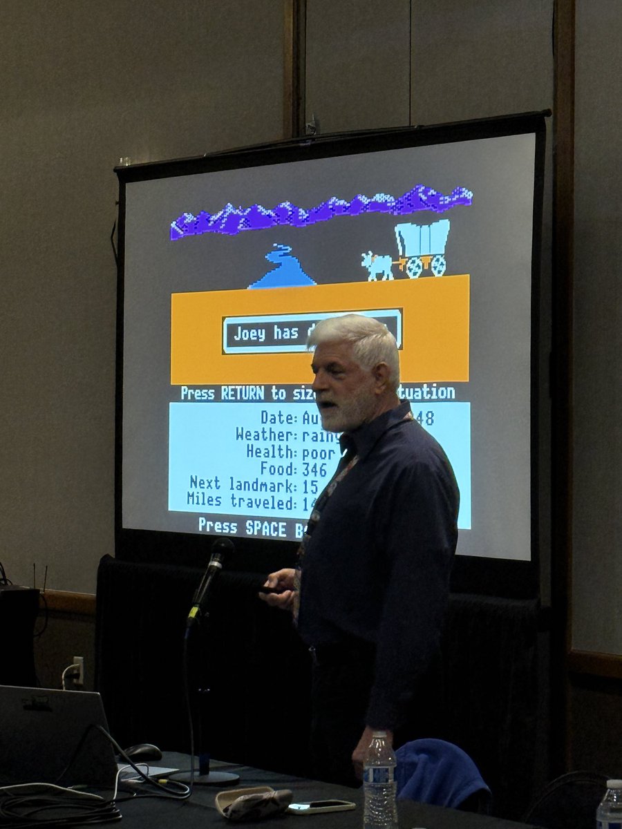 TheGDEX's tweet photo. Loving this talk about redesigning The Oregon Trail with Philip R. Bouchard. #GDEX2026 https://t.co/UfLjfzZzgF