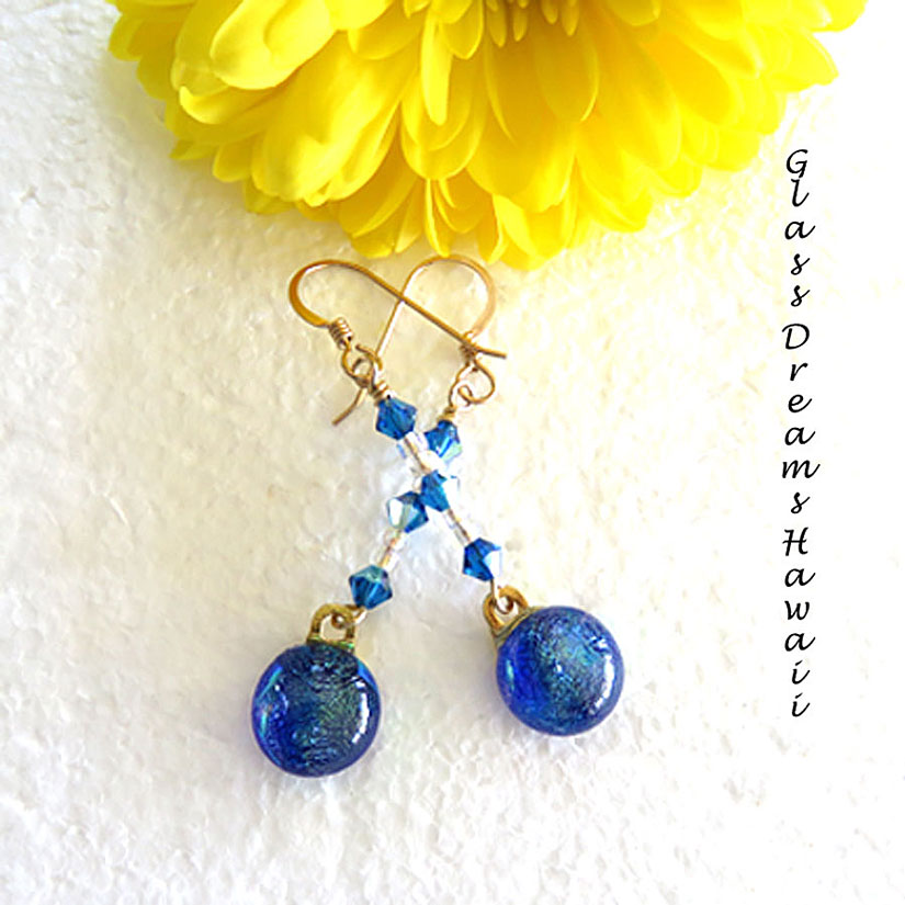 GlassHawaii's tweet photo. https://t.co/D8J53SGEan Azure Blue Dichroic Glass Dangle Earrings #handmade #goldfilledfindings #swarovskicrystals #featherlight #giftideas https://t.co/zzzWJ2iWlM