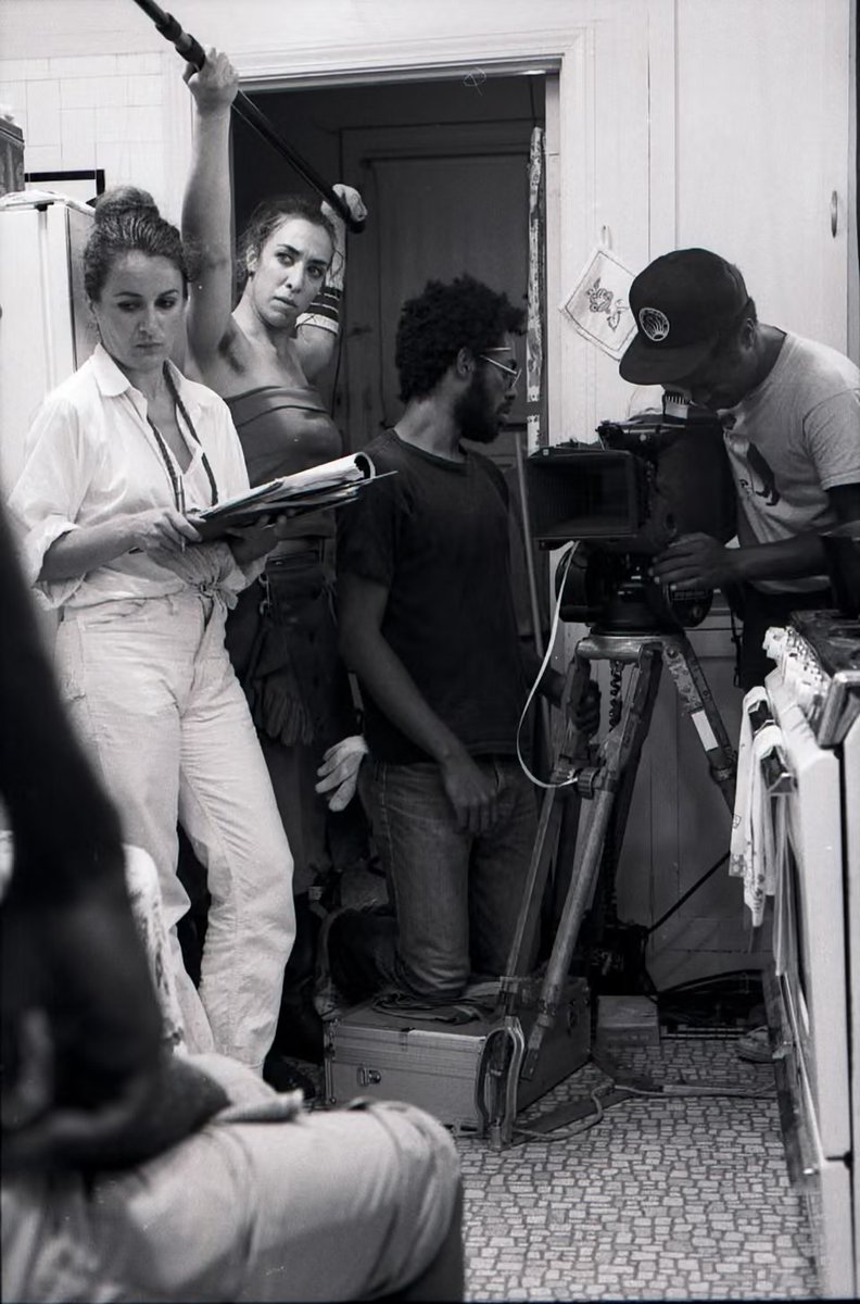 mayascade's tweet photo. the unseen “my brother’s wedding” set photos were discovered and scanned in by me in spring 2025. 

this photo with arthur jafa (1st camera; first ever film set; left) and charles burnett is one of my favorites. see the others: https://t.co/0R0ooPlF6f https://t.co/5ZKa0xBiYc