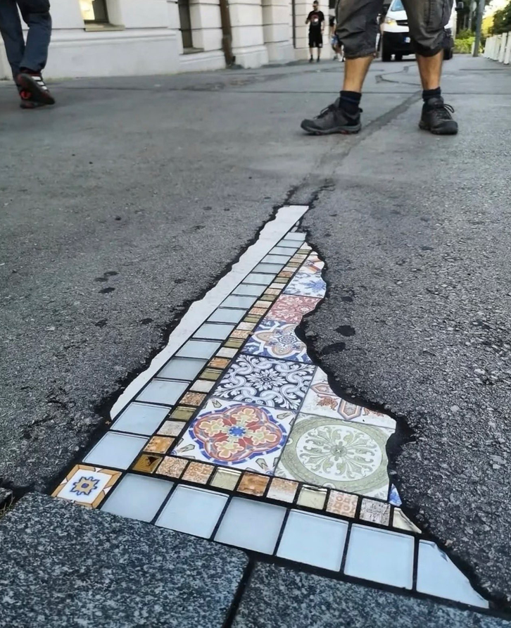 petalesblancs's tweet photo. urban cracks with colorful ceramic and tile mosaics https://t.co/M8xFT8LLRa