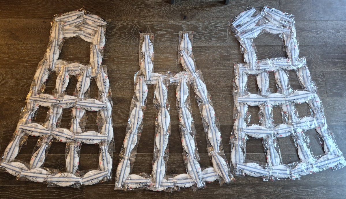 michael_hoerger's tweet photo. Tomorrow, I aim to establish an initial world record for N95s worn during a 5K. 

4 will be for my respiratory protection (1 at a time). The cape is made of 104 (39 + 26 + 39).

Here's a sneak peek of the cape layers. https://t.co/sCxqGjNGi9