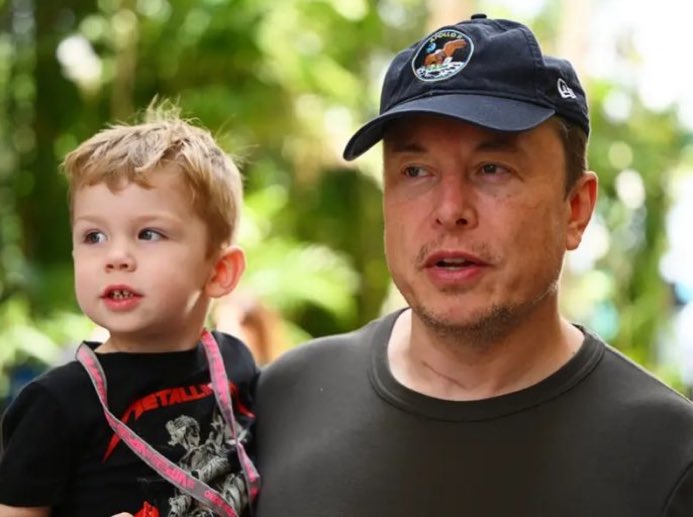 Alexs_jame's tweet photo. Elon Musk and his cute son X Æ A-12 (who is probably a Metallica fan 😂) visited the Oracle Red Bull Racing team at the Formula 1 Grand Prix in Miami. It's nice to see how a father includes his son in every aspect of his life. This is really not a common occurrence among people https://t.co/rC7jiby2kF