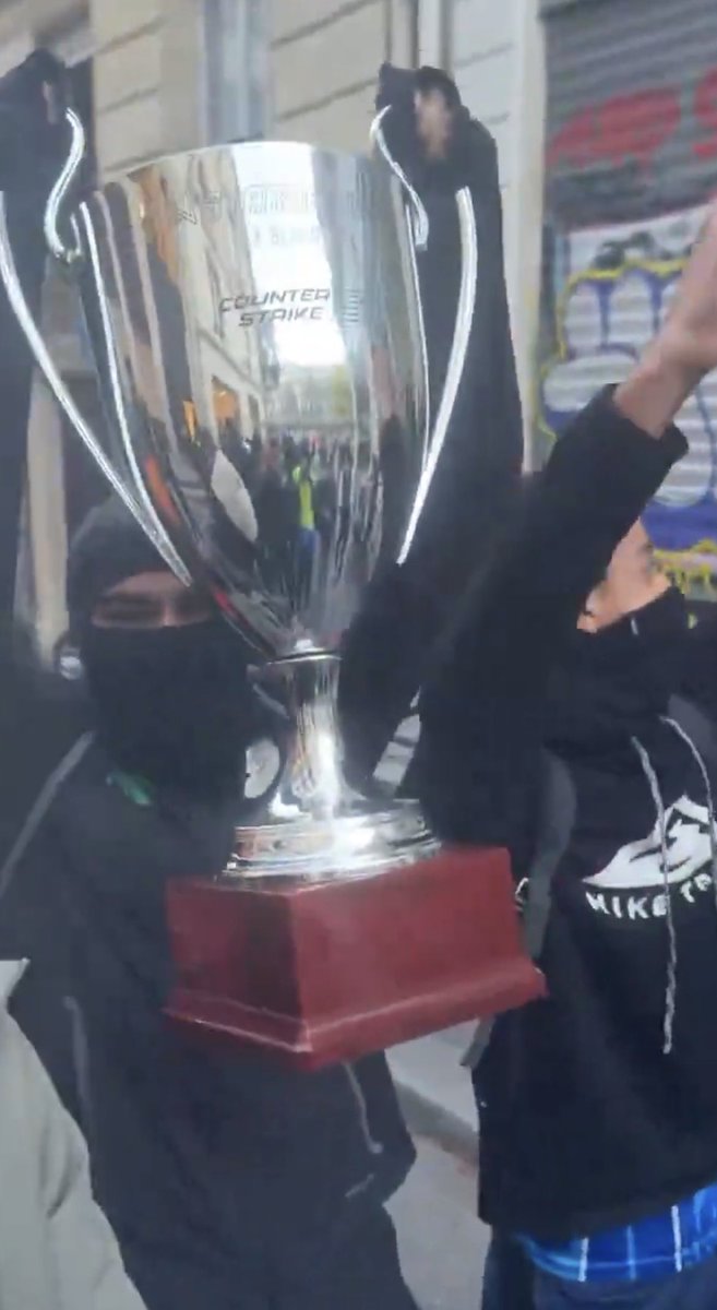 Pirat_Nation's tweet photo. Team Vitality’s V.Hive headquarters in Paris was looted and vandalized during the recent unrest.

The thieves took merchandise, computer equipment and trophies, one of the stolen trophies was the StarLadder StarSeries Fall 2026 trophy, which Vitality won in September.

Videos from the scene show people carrying the trophy away and taking apart gaming PCs to remove their components. Other equipment, including gaming chairs, was also taken.