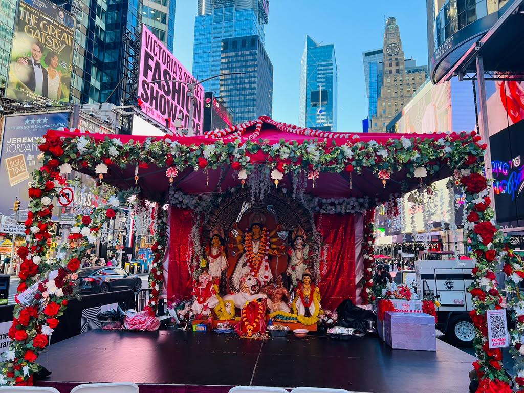 PTI_News's tweet photo. PHOTO | USA: The vibrant festivities of Durga Puja celebrated at New York City's Times Square.

(Source: Third Party/ Organising team) https://t.co/rEYaubbTdM