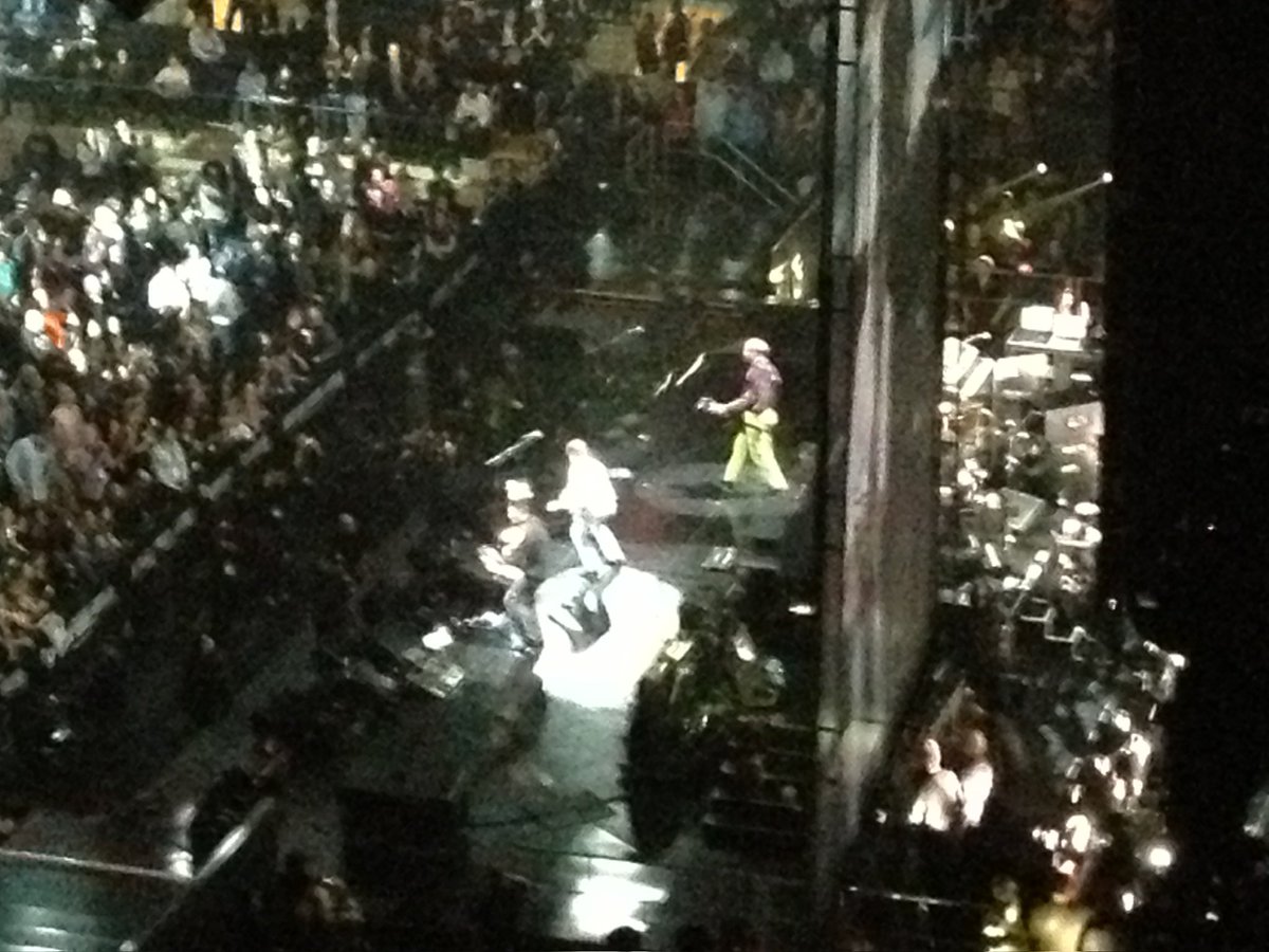AndrewHarts's tweet photo. I was at MSG that night for the 12/12/12 show. That thing ran SO damn long but it was truly one of the most incredible collection of talent for one show. This reunion happened at 1am! Here’s a pic from that moment. 

And yes, iPhone cameras have come a long way. https://t.co/rMSYNb9WxO