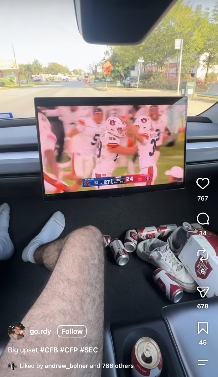 dallastesla's tweet photo. Lmao. Hell of a way to watch Auburn beat Georgia! *do not drink alcohol in cybercabs https://t.co/Ljy3YYvLaq