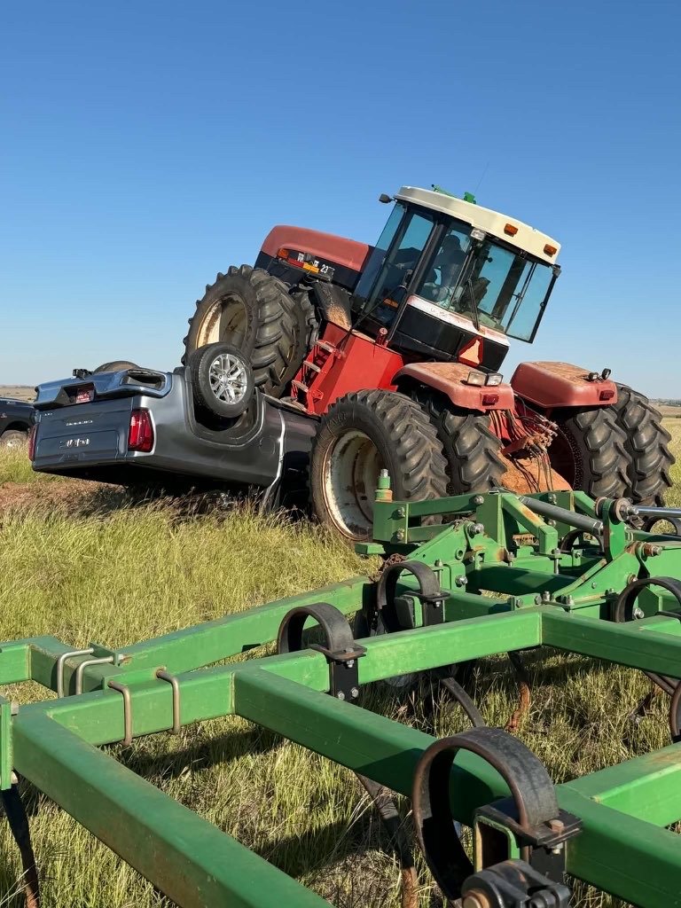 okiefarmer1's tweet photo. If you've ever been curious how Mahindra tractors are made this is a rare intimate moment almost never photographed. 🫢🫢🙄 But seriously ALWAYS make sure it's out of gear before you jump a starter! Not mine happened west of town. And before somebody says it. 
Yes you can't park there! 😬😬😬
