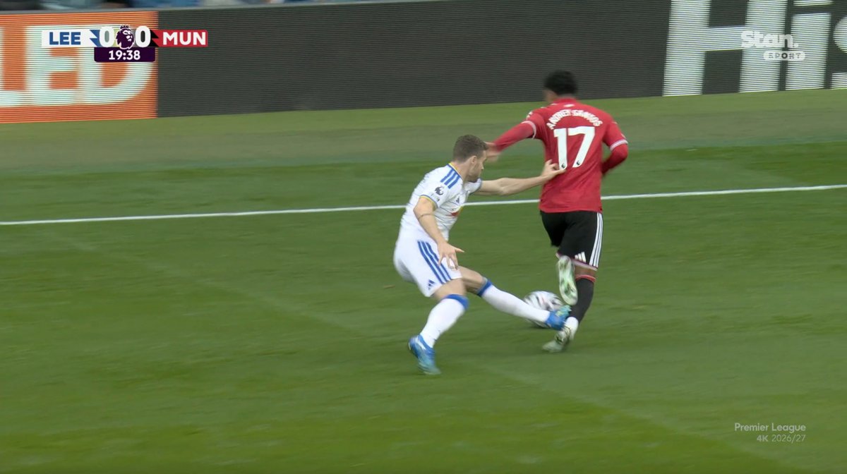 AdamJoseph's tweet photo. Ethan Ampadu wasn't booked, Bruno Fernandes (rightly) booked seconds later for a lesser challenge.

Meanwhile, this should probably be a red card for Gabriel Gudmundsson. Darren England's handling so far has been horrendous, letting it get out of control. https://t.co/y1VCzmnxhw