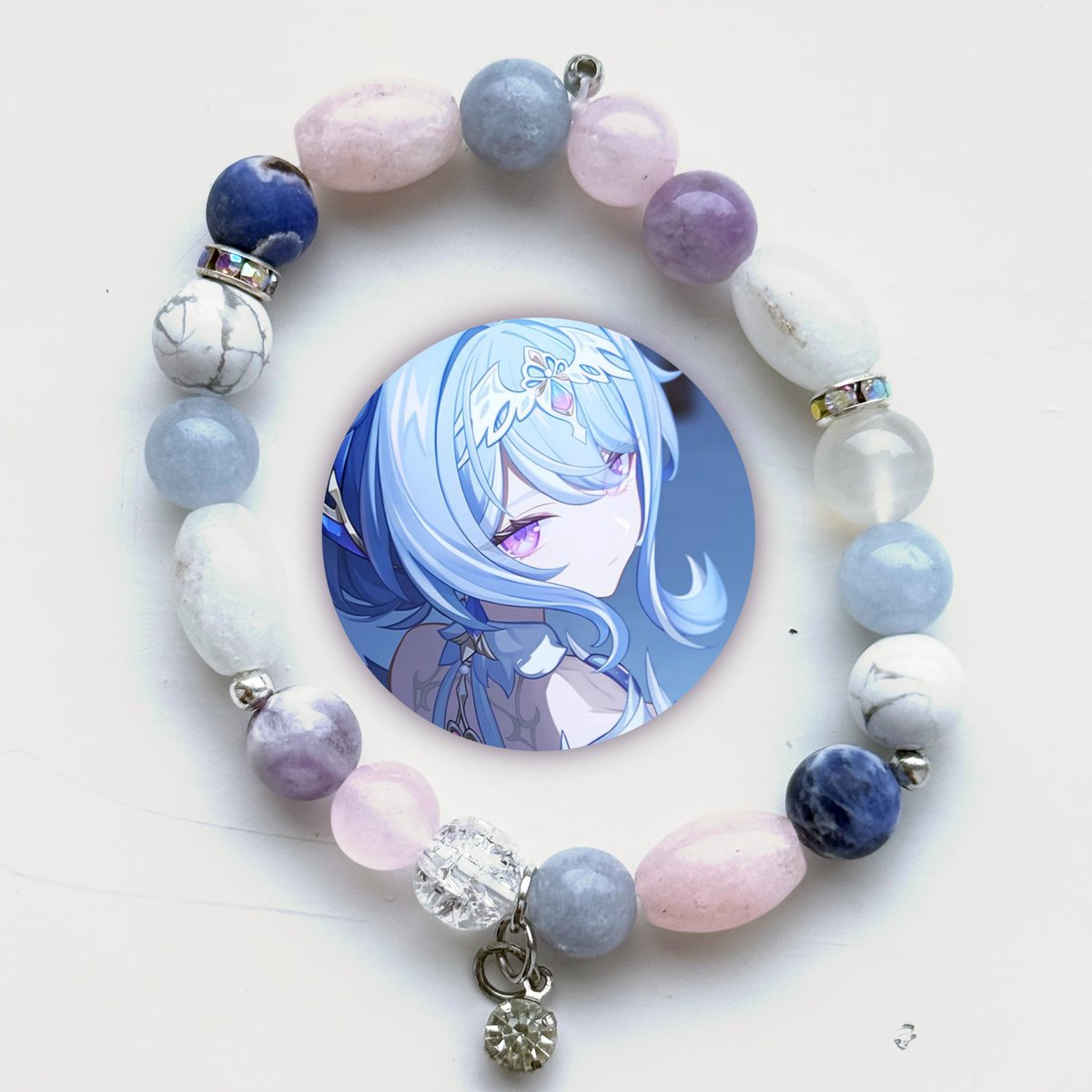 temtem019's tweet photo. yuri bracelets lmao 
#jewelry #handmade #naturalstones #vodette #odette #vodyanitsa #genshinimpact #yuri https://t.co/Vh8I8LeswC
