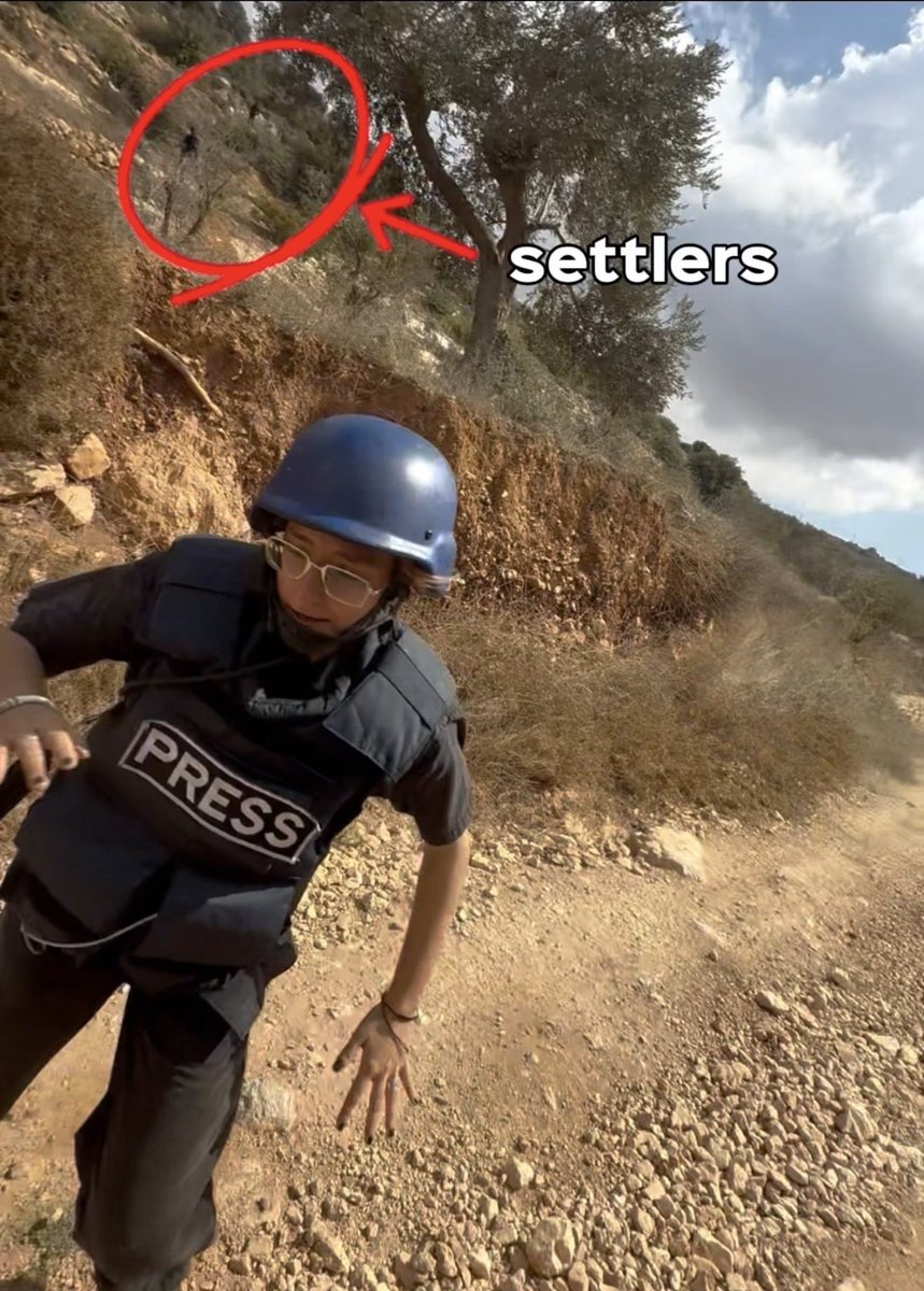 AdeleShoko's tweet photo. 🚨 Yesterday, @the_andrey_x and I were chased by masked settlers armed with clubs while reporting on the olive harvest in Jalud.

We only saw them coming when they were barely a minute away. Stones were already landing right next to us.

We are alive thanks to Palestinians from Jalud and Qusra, who led us to safety.

This was the THIRD attack on international journalists in just TWO DAYS.

FULL REPORT SOON.