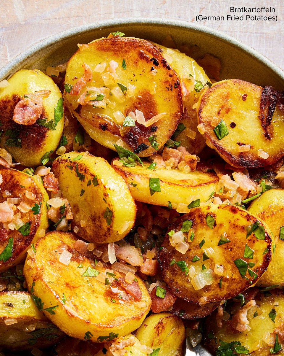 TestKitchen's tweet photo. A jumble of sliced potatoes, onions, and bacon, Bratkartoffeln is a simple pleasure. https://t.co/Llo51ZbeSh https://t.co/y2iDijuK0k