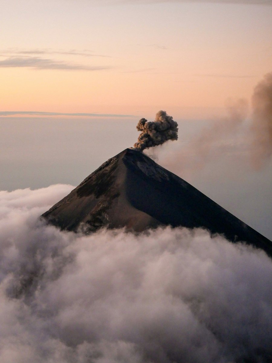 unsplash's tweet photo. This image by Sophia DiDonato is nominated for the Photo of 2026 Award. 🏆 📸

Shortlisted by Toa Heftiba: “It makes me feel something I can’t quite put into words, which is usually what draws me to an image. It feels almost like a visual metaphor: the volcano quietly holding all that power beneath the surface while the soft clouds and light make everything feel strangely calm. Beautiful, atmospheric and a little haunting.”

Vote for this image at https://t.co/8vvTjwaniz.